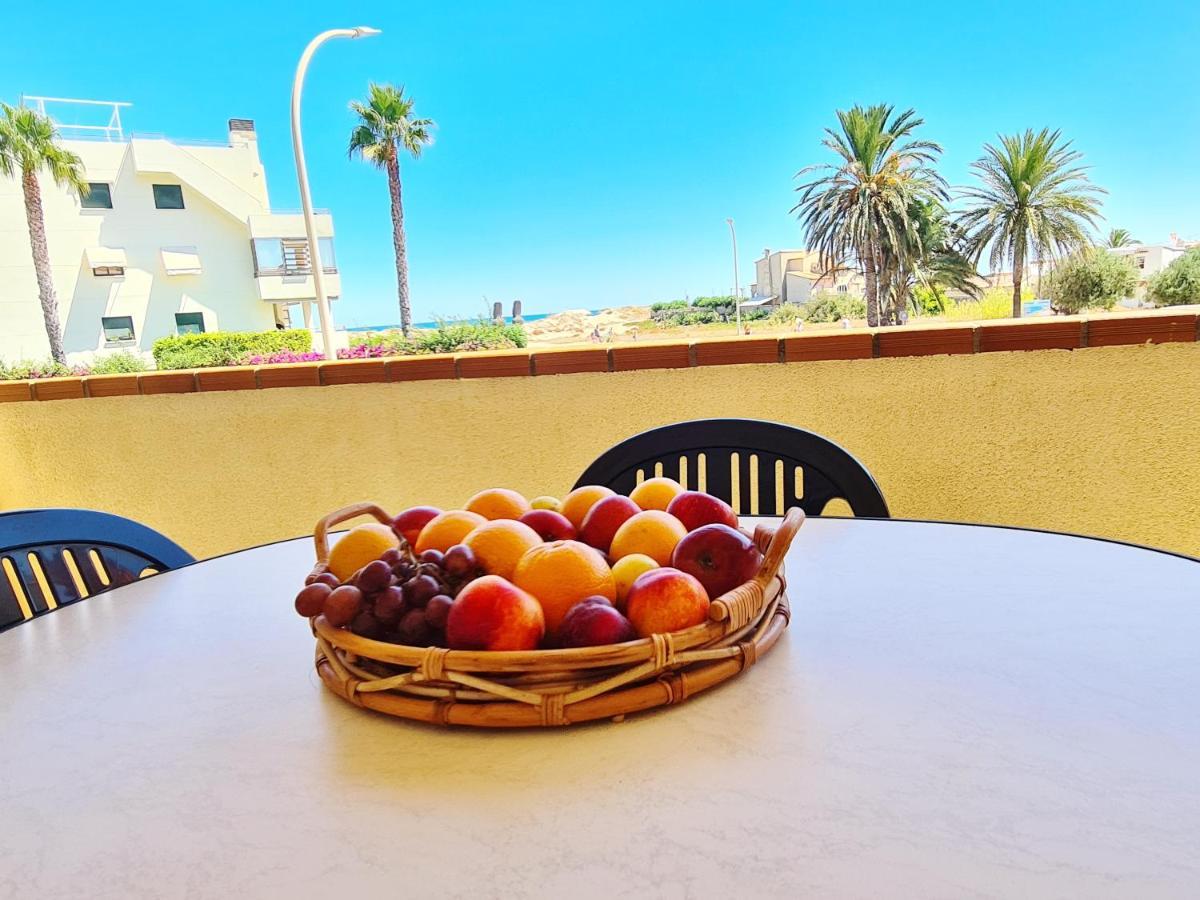 Apartamento con piscina frente al mar. Oliva Nova Exterior foto
