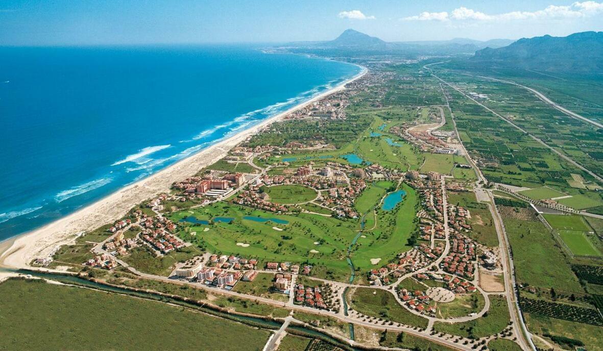 Apartamento con piscina frente al mar. Oliva Nova Exterior foto