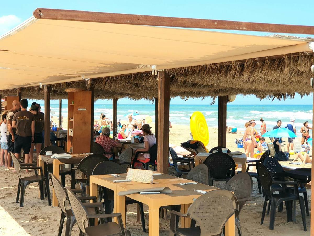 Apartamento con piscina frente al mar. Oliva Nova Exterior foto